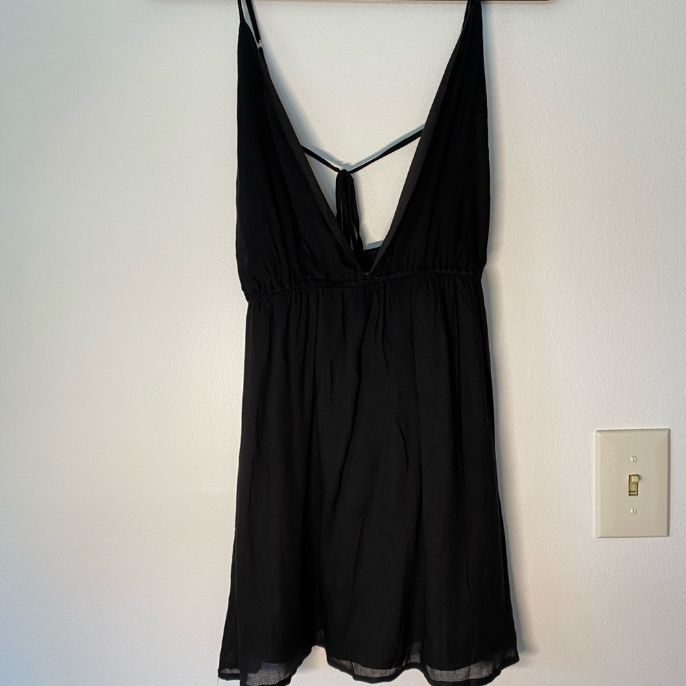 Black cotton mini dress with tie back detail